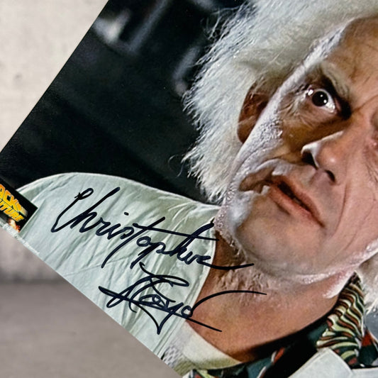 Foto Dr Emmett Brown firmada por Chistopher Lloyd