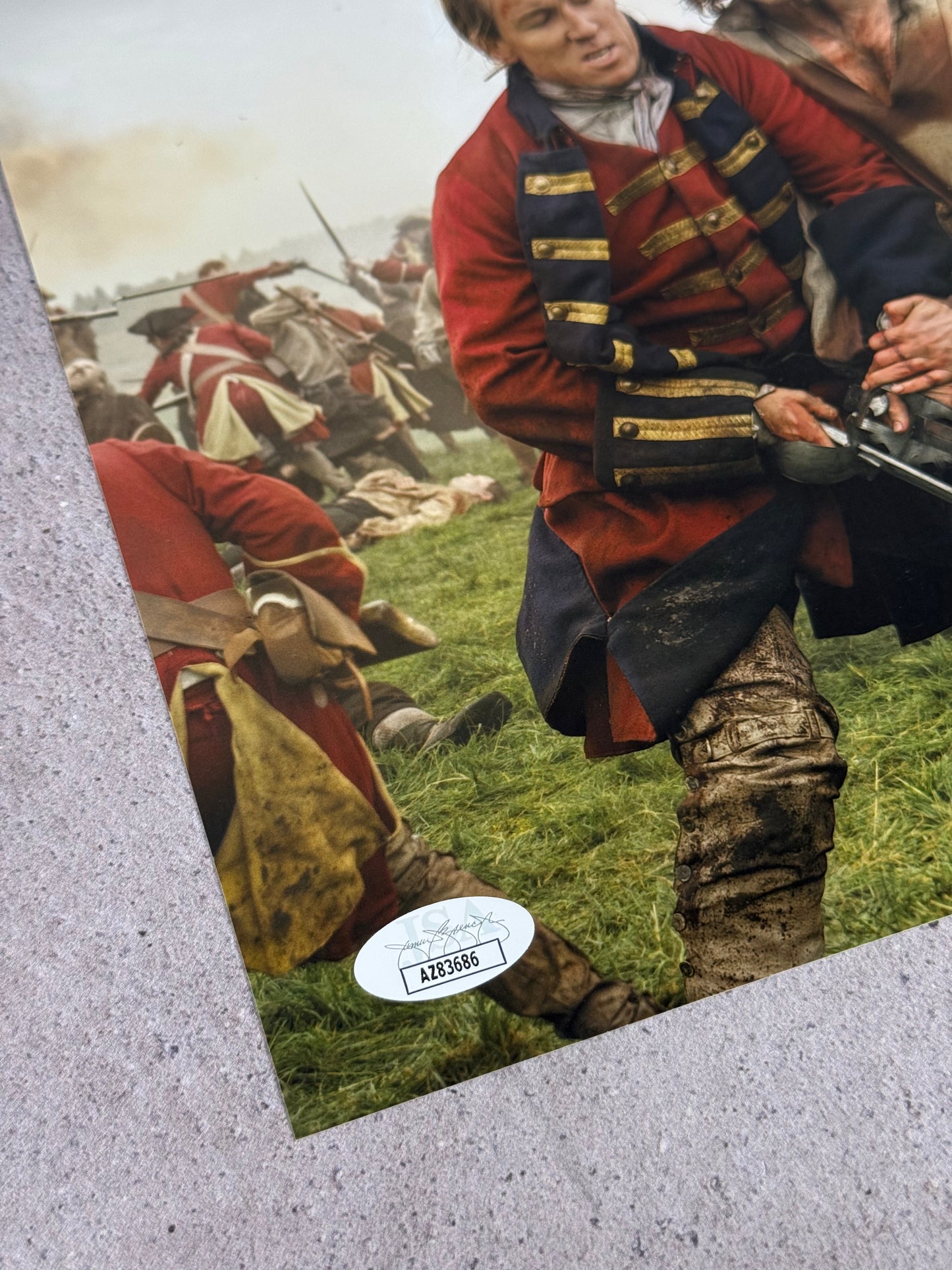 Outlander – Fotografía firmada por Sam Heughan con JSA