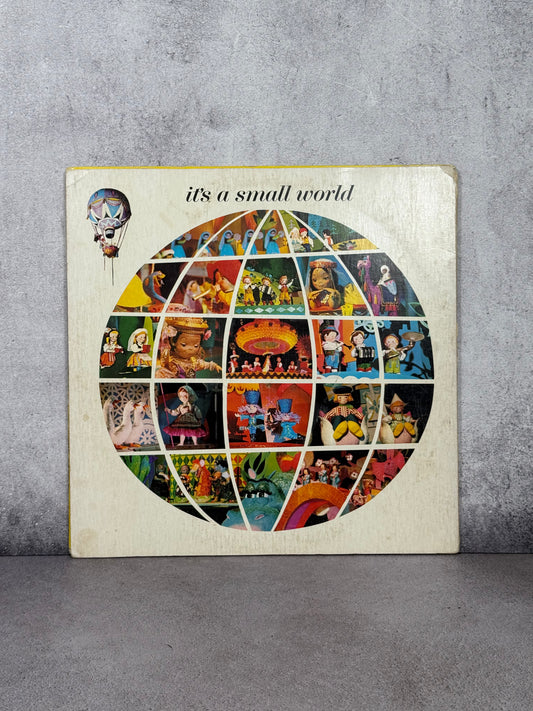 Vinil Disneyland “Small World” 1964 – Firmado por Bob Gurr (JSA)