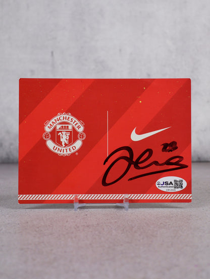 Postal Manchester United inauguración estadio Akron firmada por Johnny Evans (JSA)