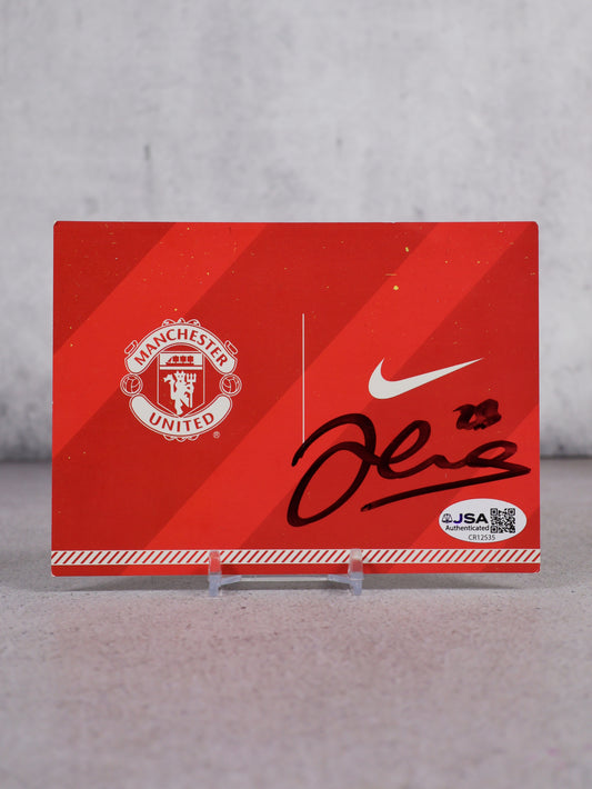 Postal Manchester United inauguración estadio Akron firmada por Johnny Evans (JSA)