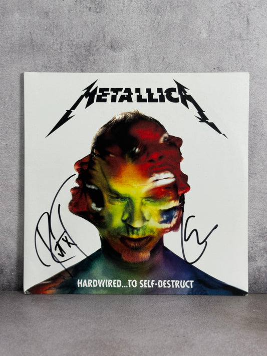 Vinil Metallica firmado por Lars Ulrich y Robert Trujillo certificado por JSA