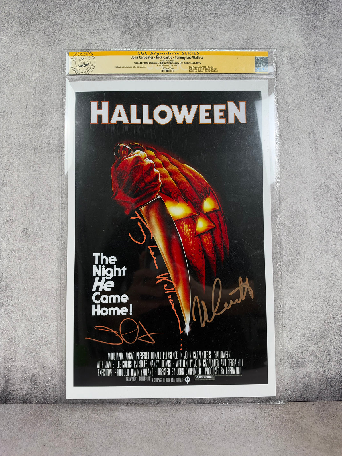 Póster Halloween firmado por Nick Castle, John Carpenter y Tommy Lee Wallace – CGC