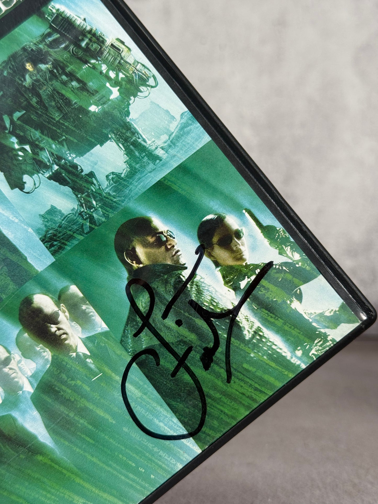 DVD original Matrix Revoluciones firmado por Laurence Fishburne (Morpheus) (JSA)