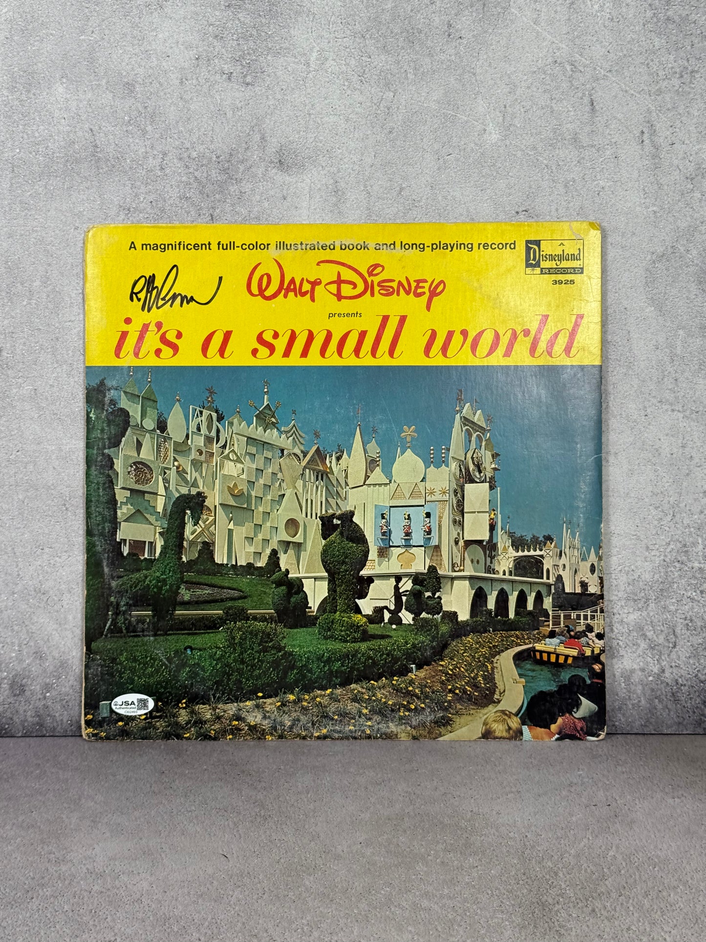 Vinil Disneyland “Small World” 1964 – Firmado por Bob Gurr (JSA)